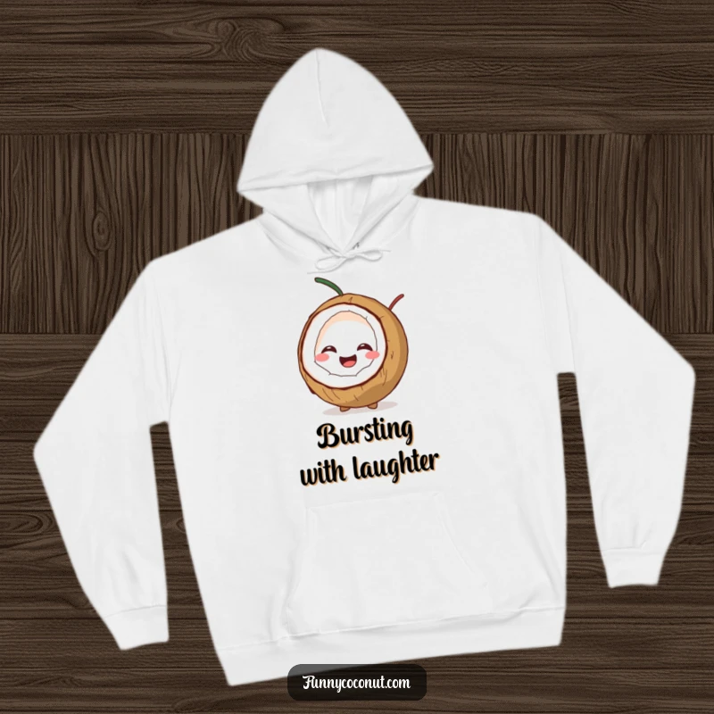 Funny hoodie portraying a coconut character splitting open with a wide, infectious giggle, bringing warmth and humor.