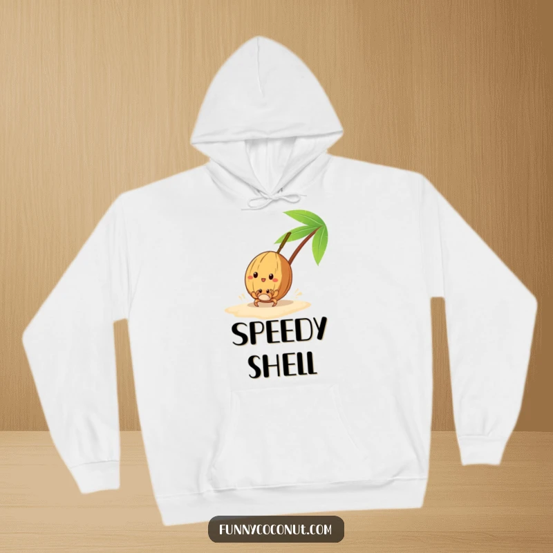 Funny, cozy hoodie featuring a coconut racing a tiny crab on the sand, perfect for warmth and smiles.