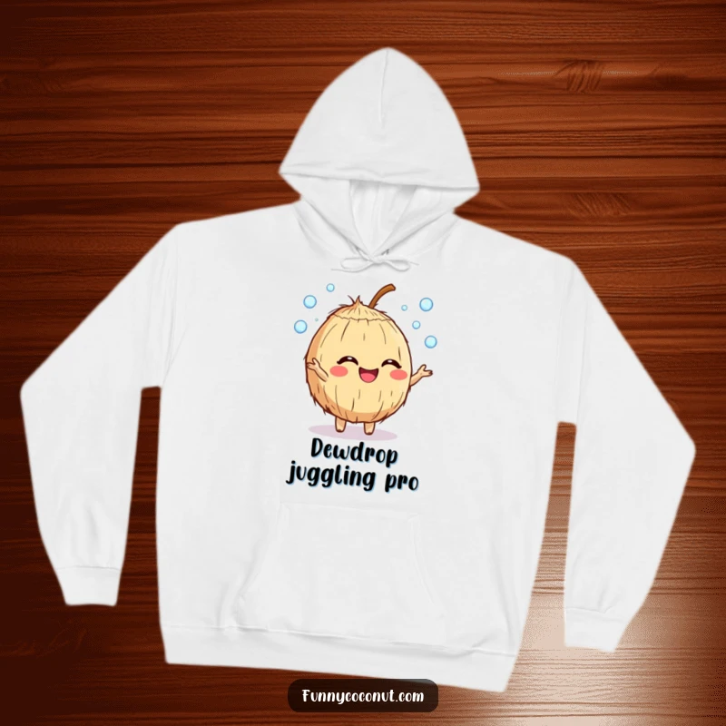 Funny giggling coconut character hoodie, juggling dewdrops with a happy expression, cozy and perfect for cold weather.