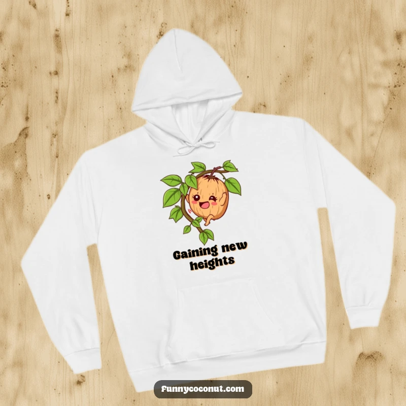 Funny Determined Coconut Hoodie: A coconut character enthusiastically climbs a vine, symbolizing determination and tropical fun.