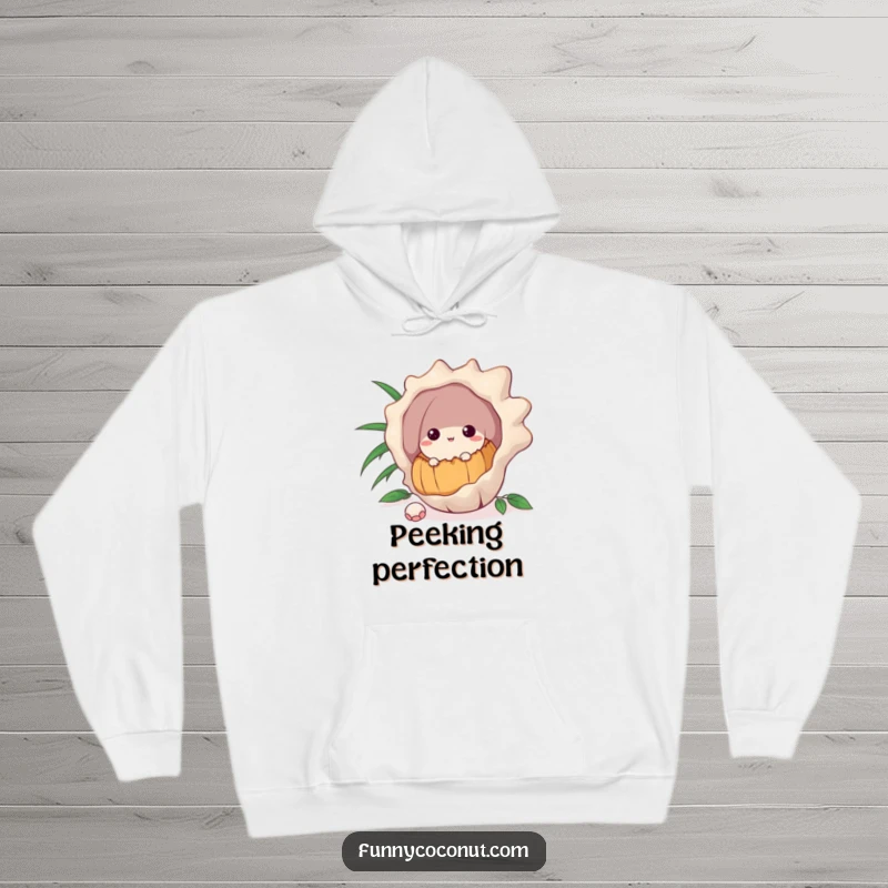 Funny hoodie depicting a curious coconut peeking from behind a large seashell, with eyes full of wonder and intrigue.