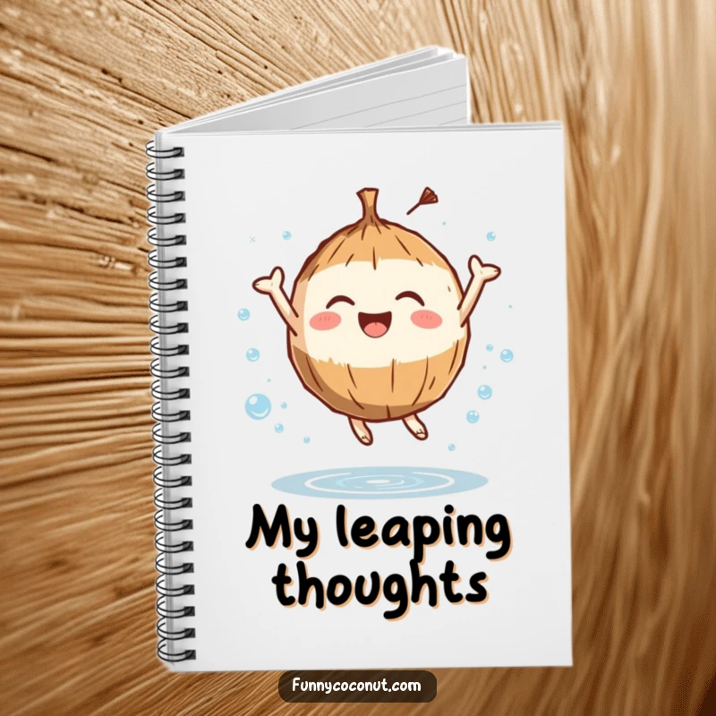 Funny notebook cover featuring a coconut character leaping with joy amidst water droplets, perfect for capturing energetic thoughts.
